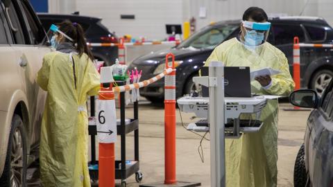 Tests being performed in the drive-thru area of the testing centre.