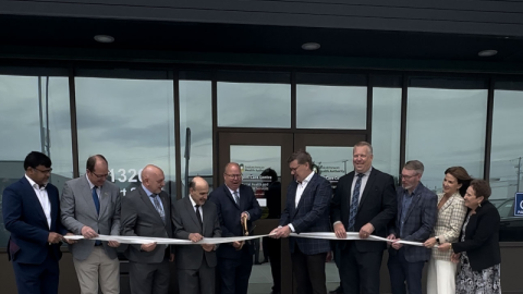 Chosen members cutting the ribbon for the grand opening of the Regina UCC