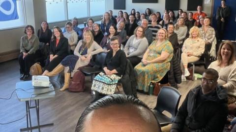 Founding Partner and Chair of OneHoop Indigenous Advisory Services Cadmus Delorme with Saskatchewan Health Authority Integrated Regina leadership and frontline staff