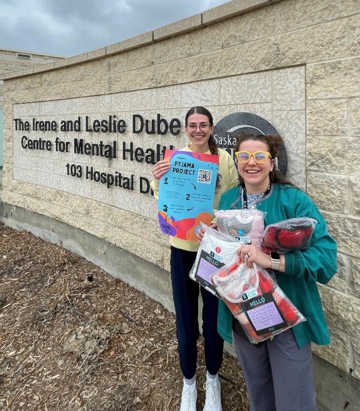 Adriane Wever and Brooke Zwozdesky standing outside of the Dubé Centre